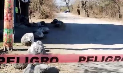 Camino de terracería acordonado