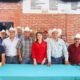 Reuniónó de campesinos con una mujer, candidata a l gobernatura de Morelos