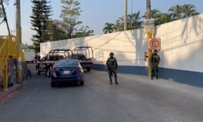 zona acordonada y patrullas de policías