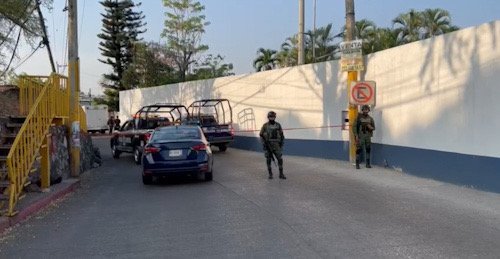 zona acordonada y patrullas de policías